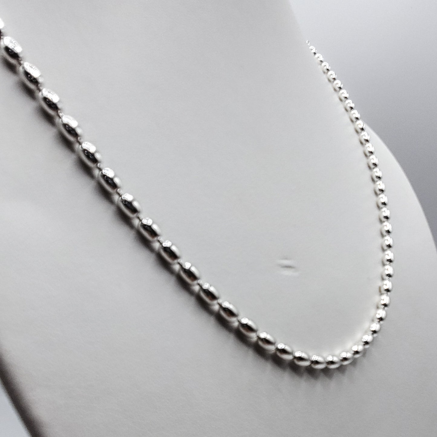 20" sterling silver oval bead necklace.