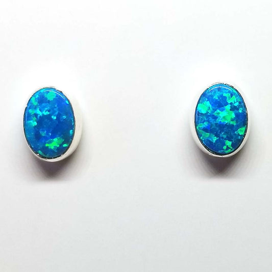 Blue lab created opal stud earrings .