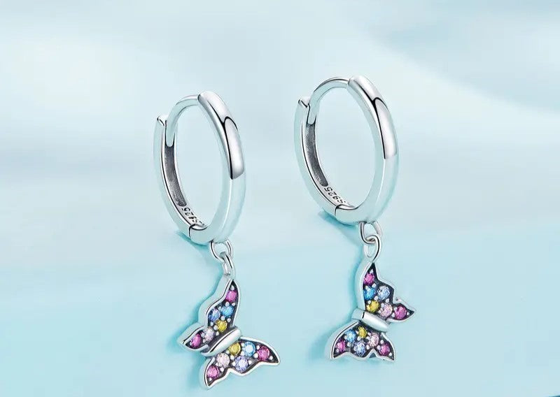 Butterfly dangle earrings with multi color crystals accents