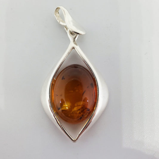 Honey Amber Oval Pendant with Silver Diamond Design