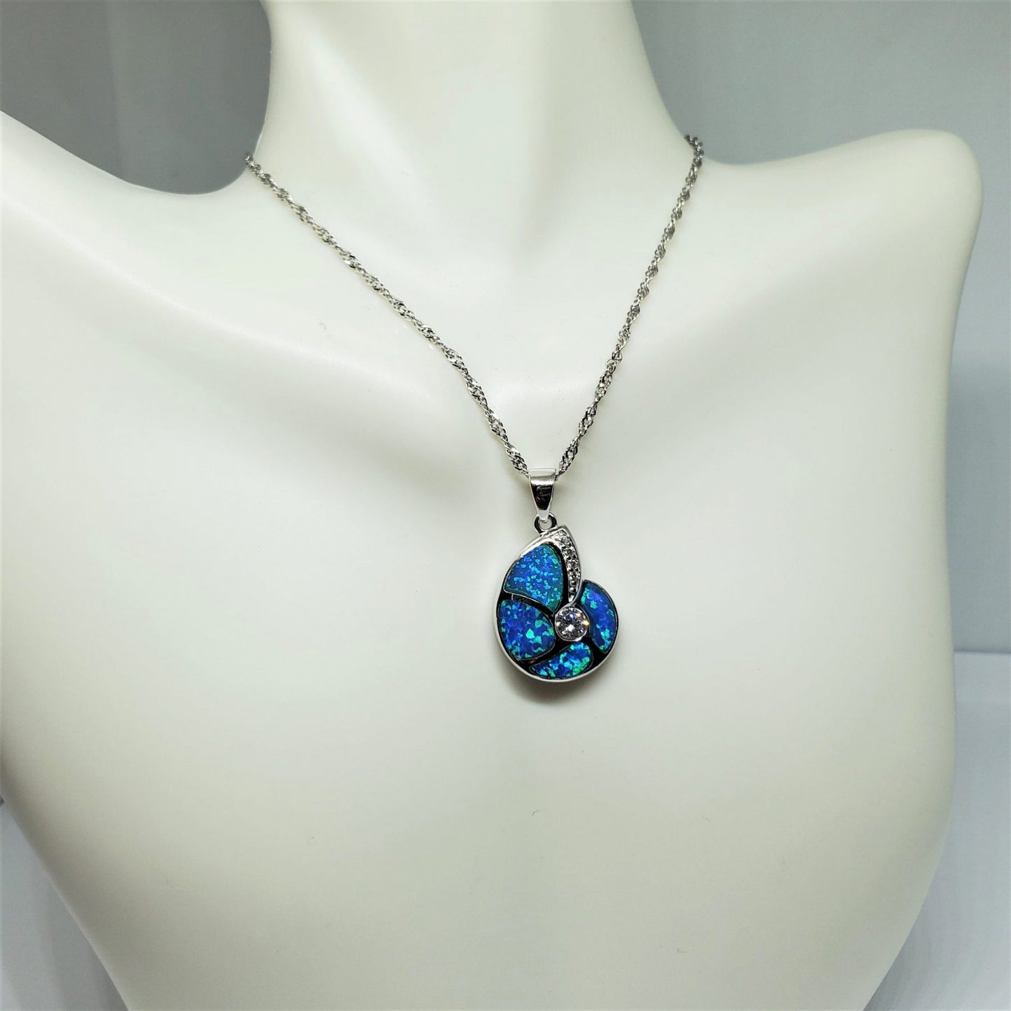 Blue Opal and Cz Snail Shell .925 Sterling Silver Pendant.