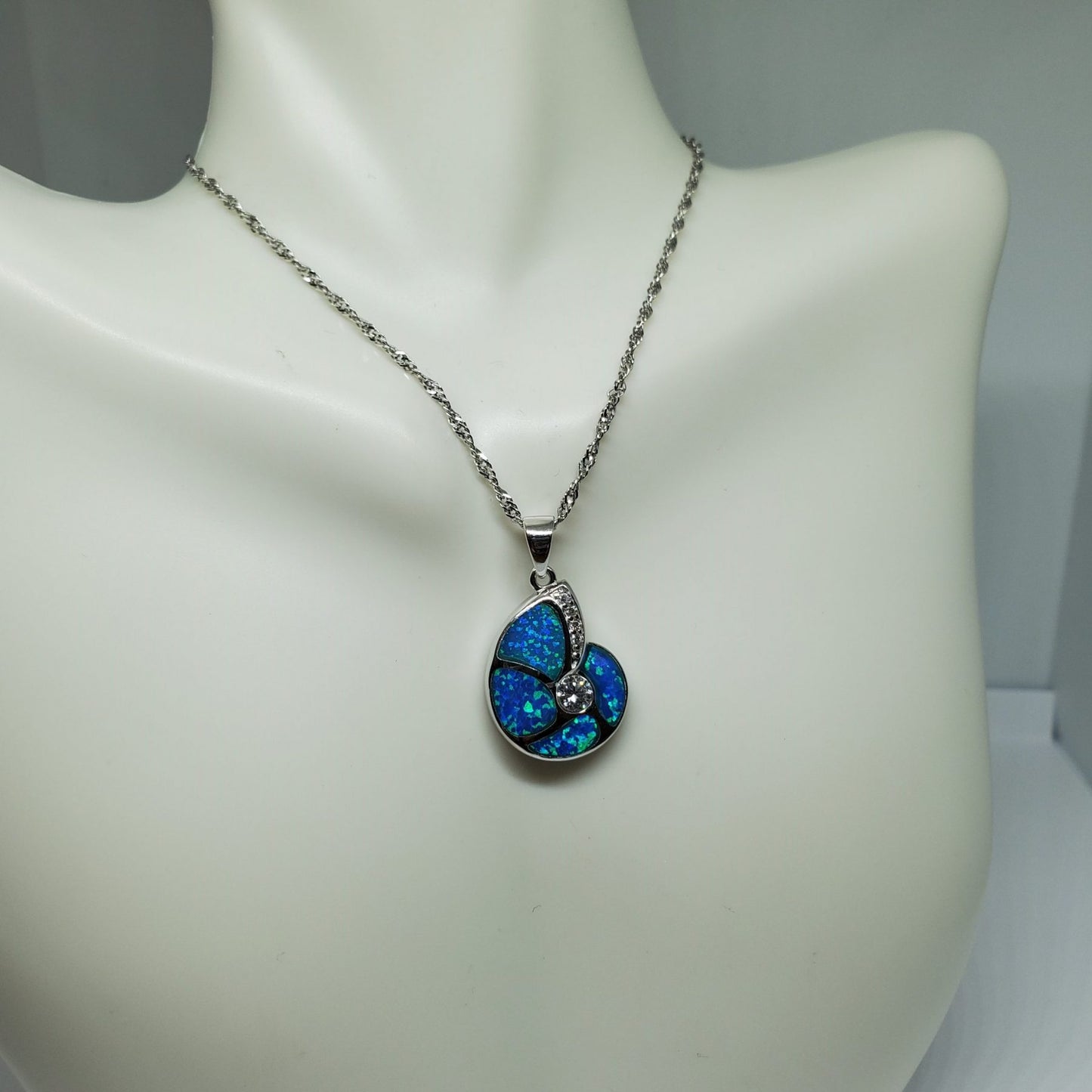 Blue Opal and Cz Snail Shell .925 Sterling Silver Pendant.