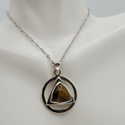 Sterling Silver tiger's eye set in geometric shaped silver frame