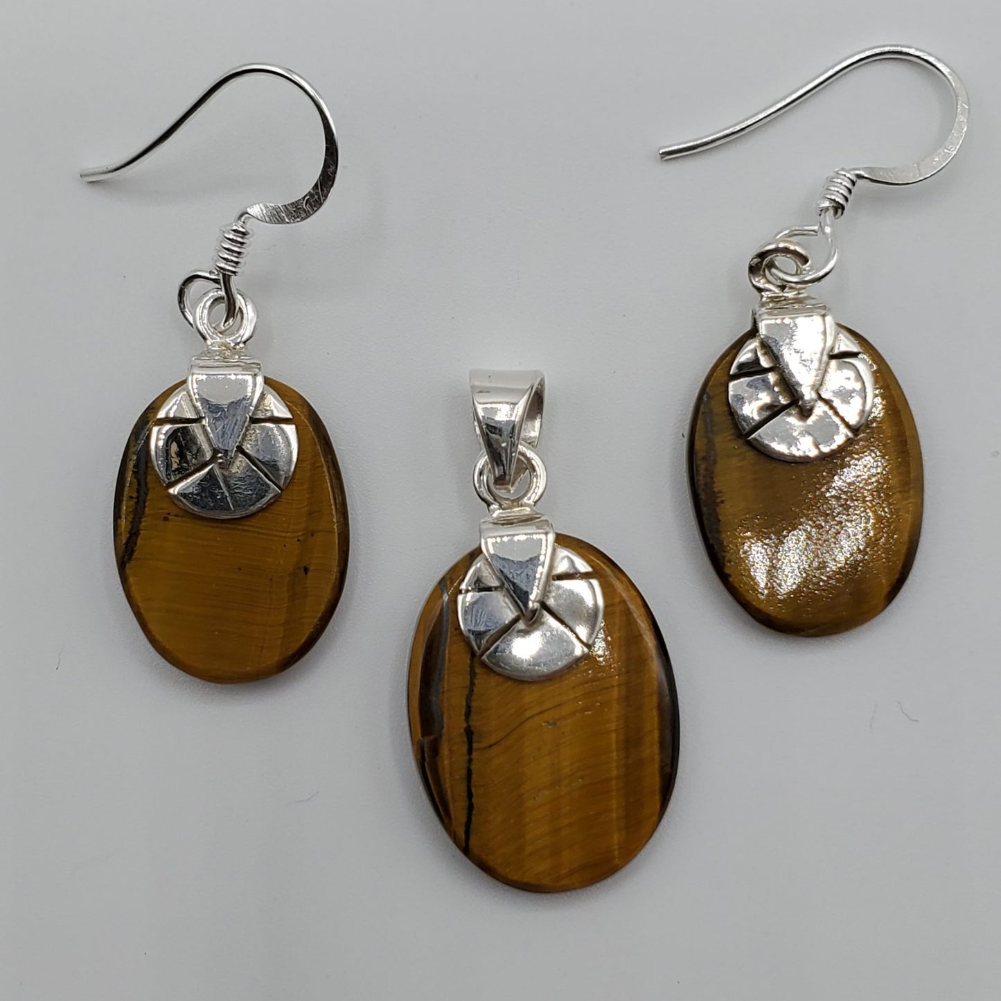 Oval Shaped Sterling Silver Tiger's Eye pendant and earrings set