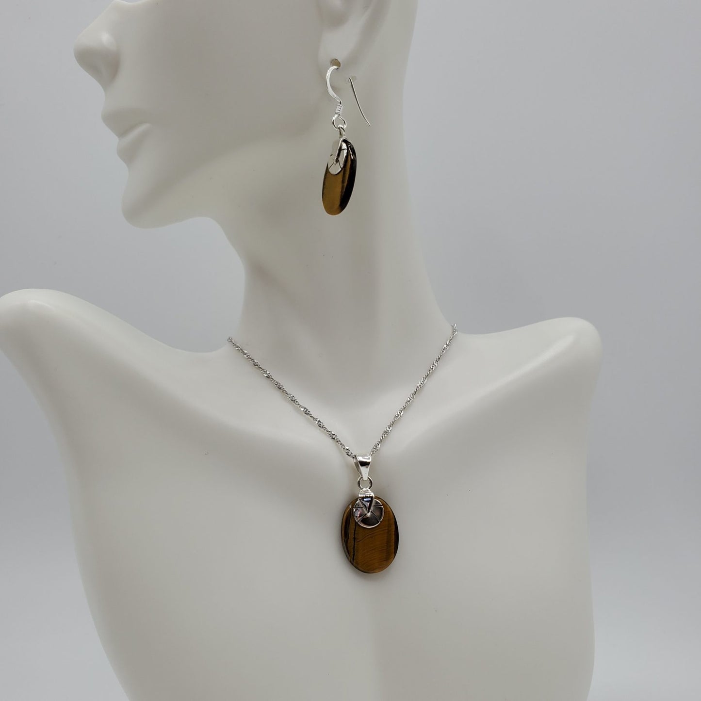 Oval Shaped Sterling Silver Tiger's Eye pendant and earrings set