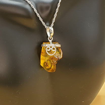 Yellow Amber Pendant Accented with Sterling Silver Filigree Heart Design