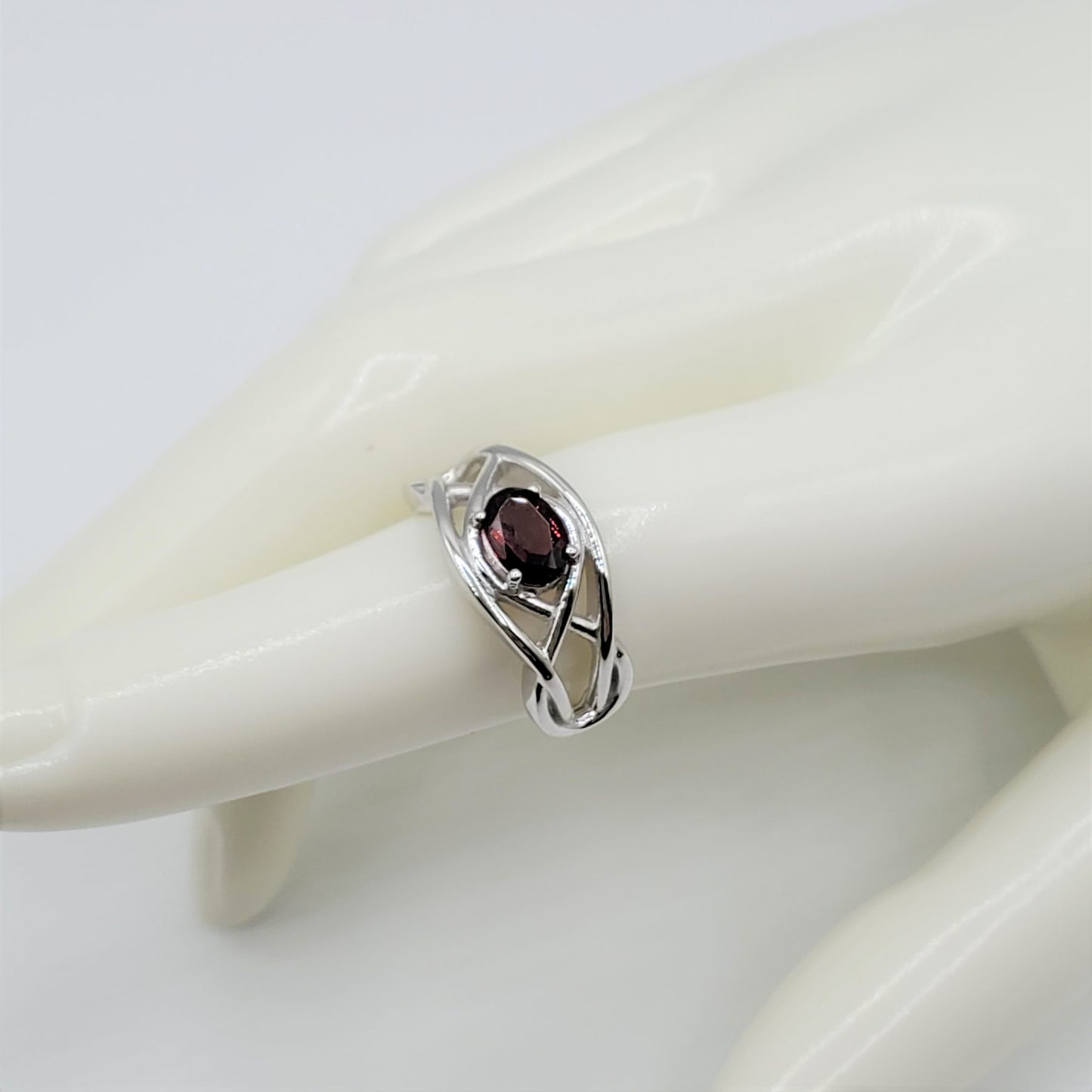 Garnet Ring with a 7.5mm oval cut center stone