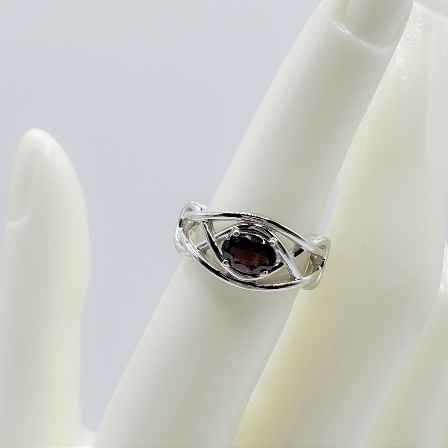 Garnet Ring with a 7.5mm oval cut center stone