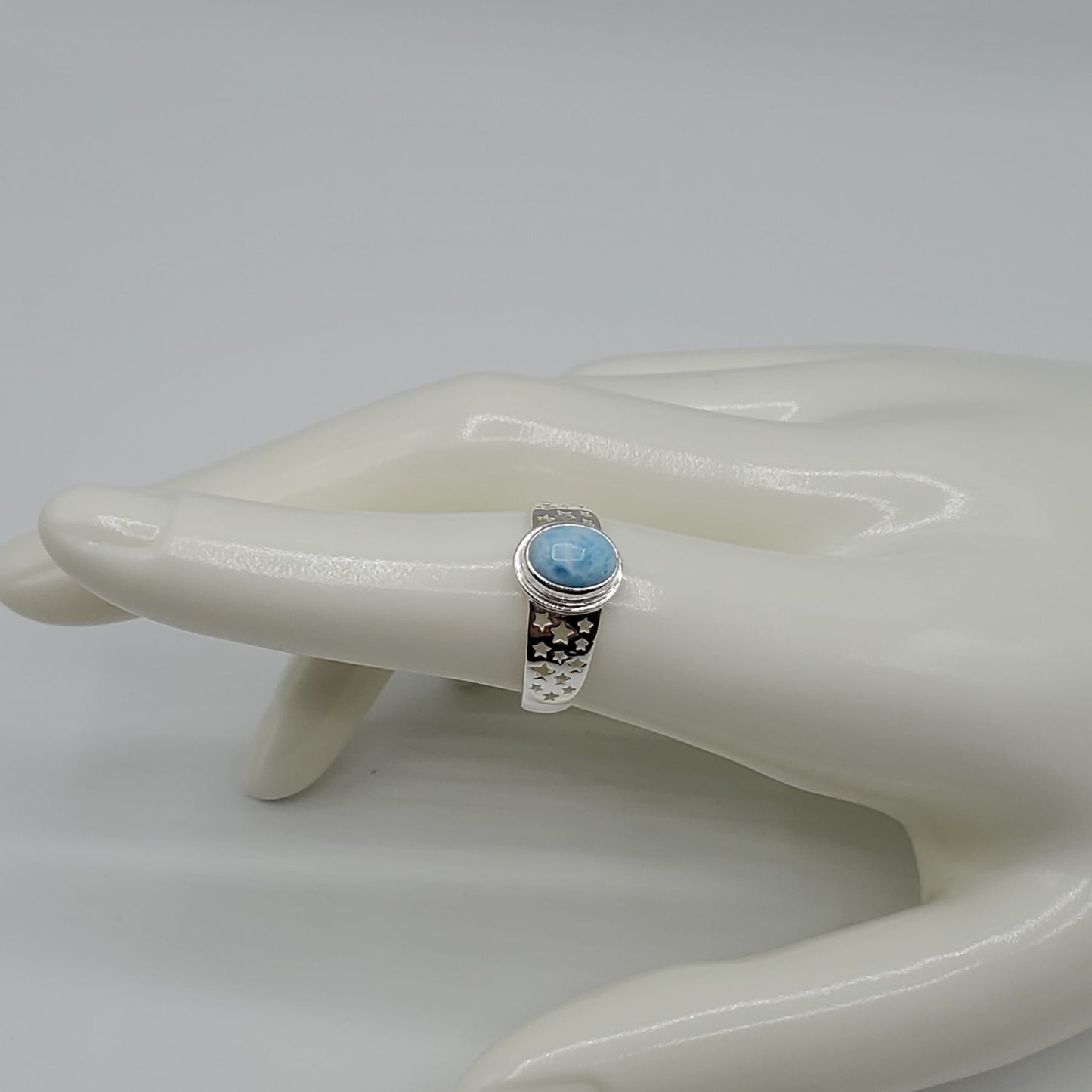 Larimar ring with an oval cut cabochon