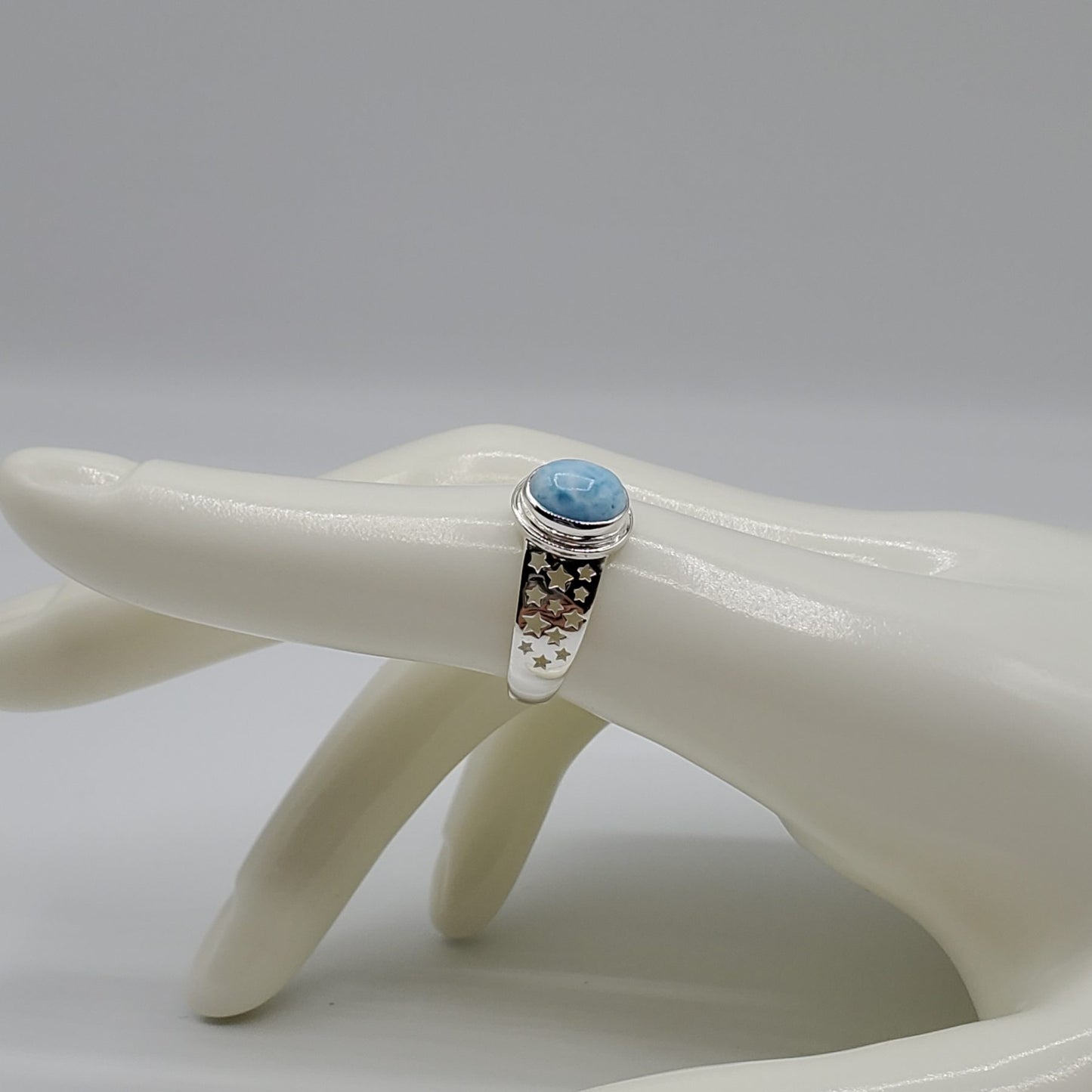 Larimar ring with an oval cut cabochon