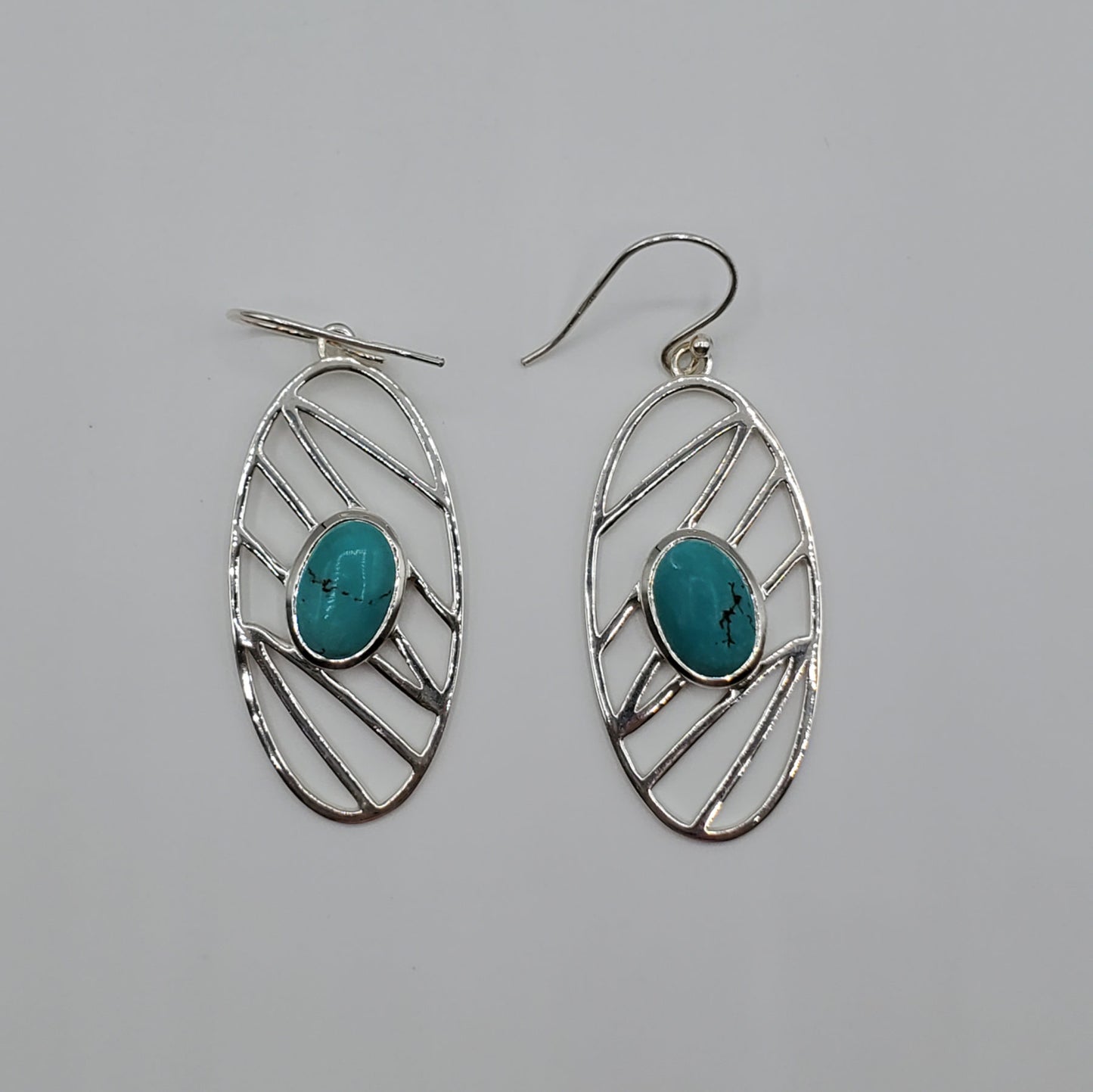 Turquoise Cabochon earrings in modern .925 Sterling Silver design.