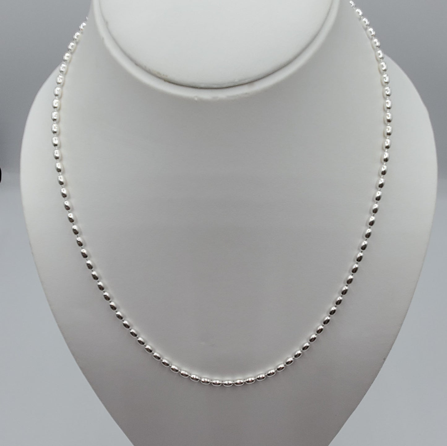 20"  sterling silver oval bead necklace.