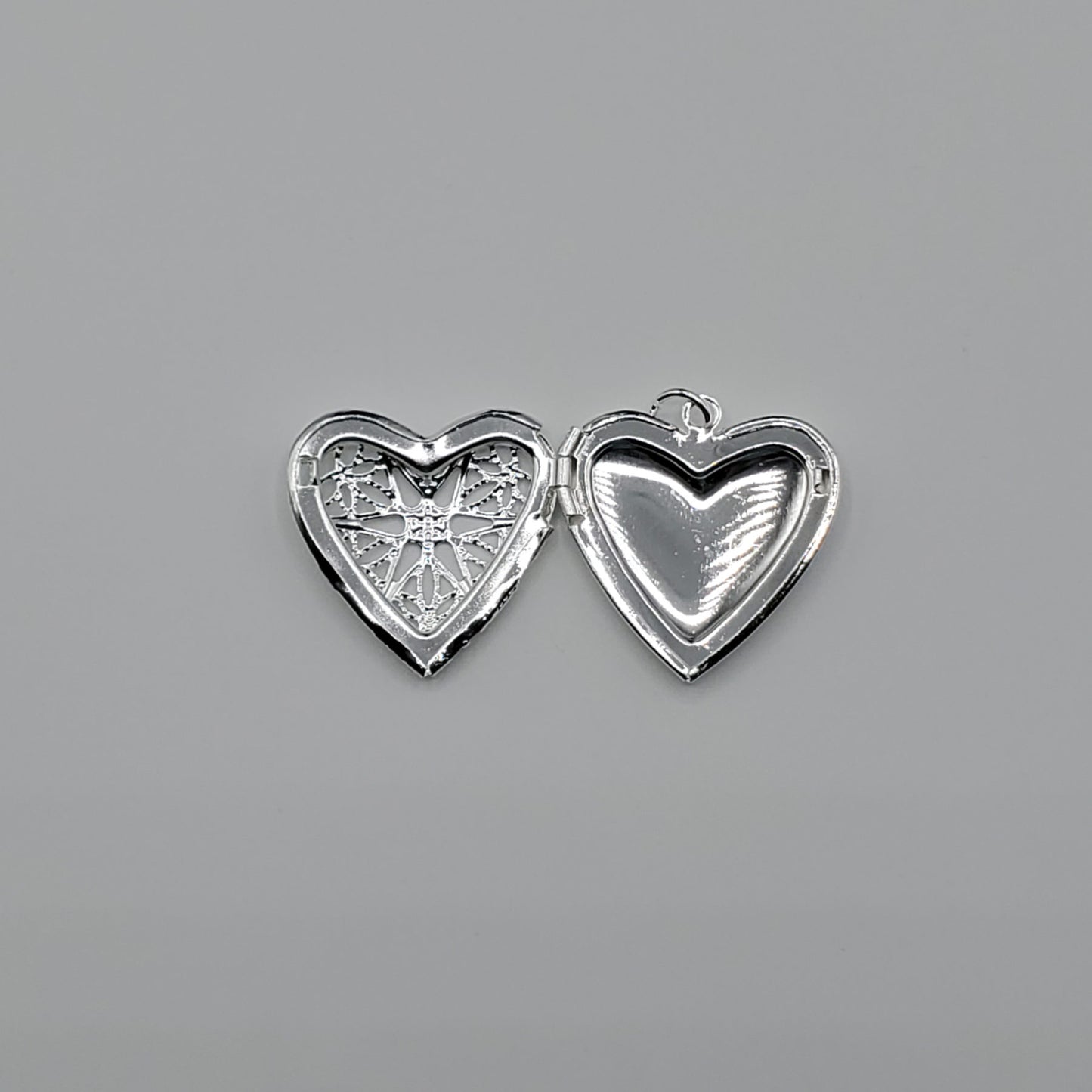 .925 Sterling Silver Heart locket on an 18" Omega chain