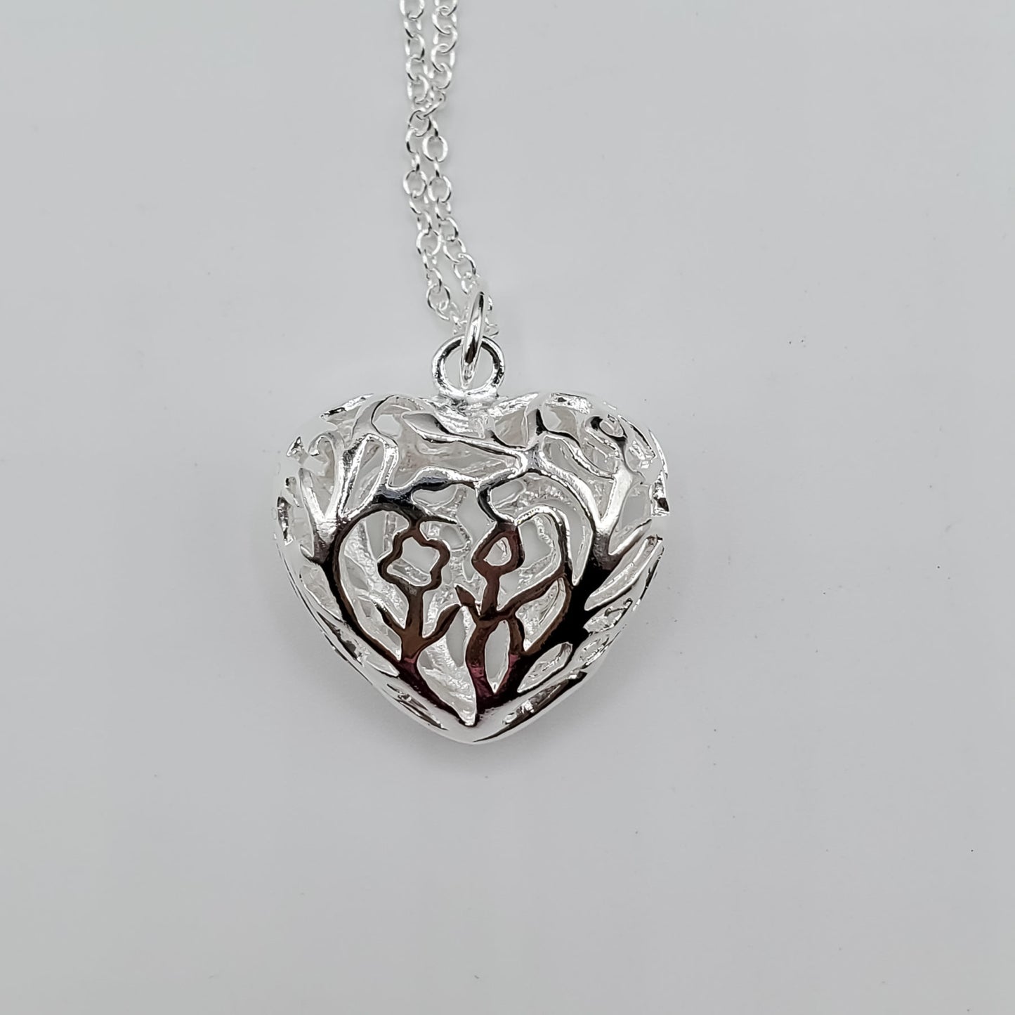 .925 sterling silver heart necklace and earring set.