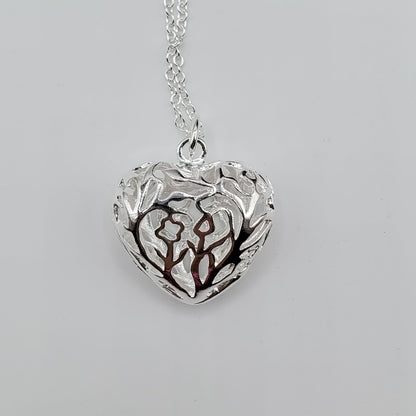 .925 sterling silver heart necklace and earring set.