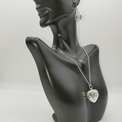 .925 sterling silver heart necklace and earring set.