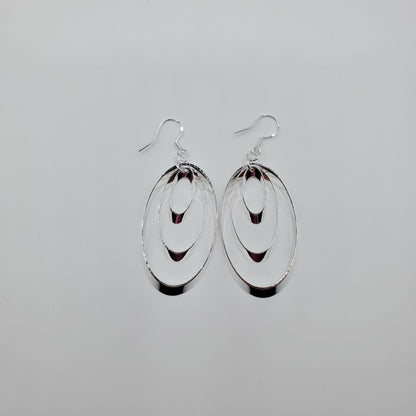 .925 Sterling Silver triple oval hoop earrings.