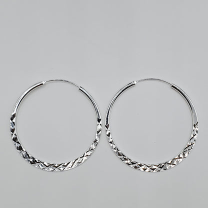 60's style .925 Sterling Silver diamond etched 54mm hoop earrings.