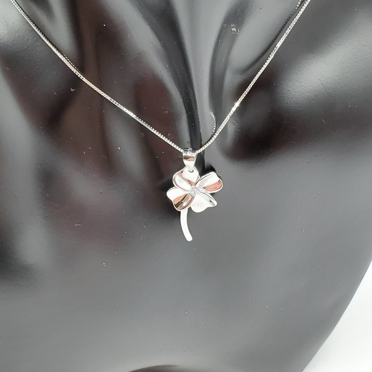 Delicate Shamrock necklace on an 18" sterling silver chain included.