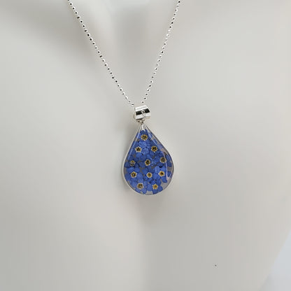 Medium resin pendant with delicate bluebell flowers