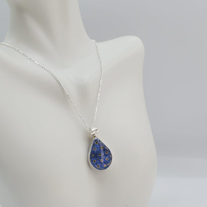 Medium resin pendant with delicate bluebell flowers