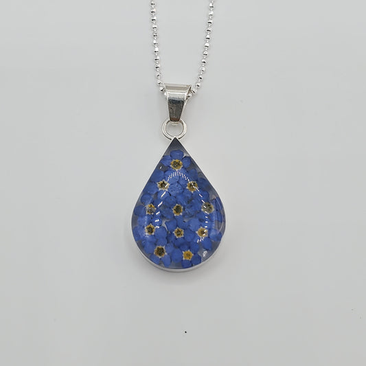 Medium resin pendant with delicate bluebell flowers