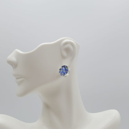 Small round blue bonnet flower stud earrings.