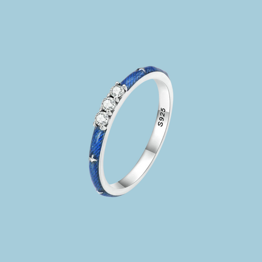 Blue enameled ring with crystal center accent stones