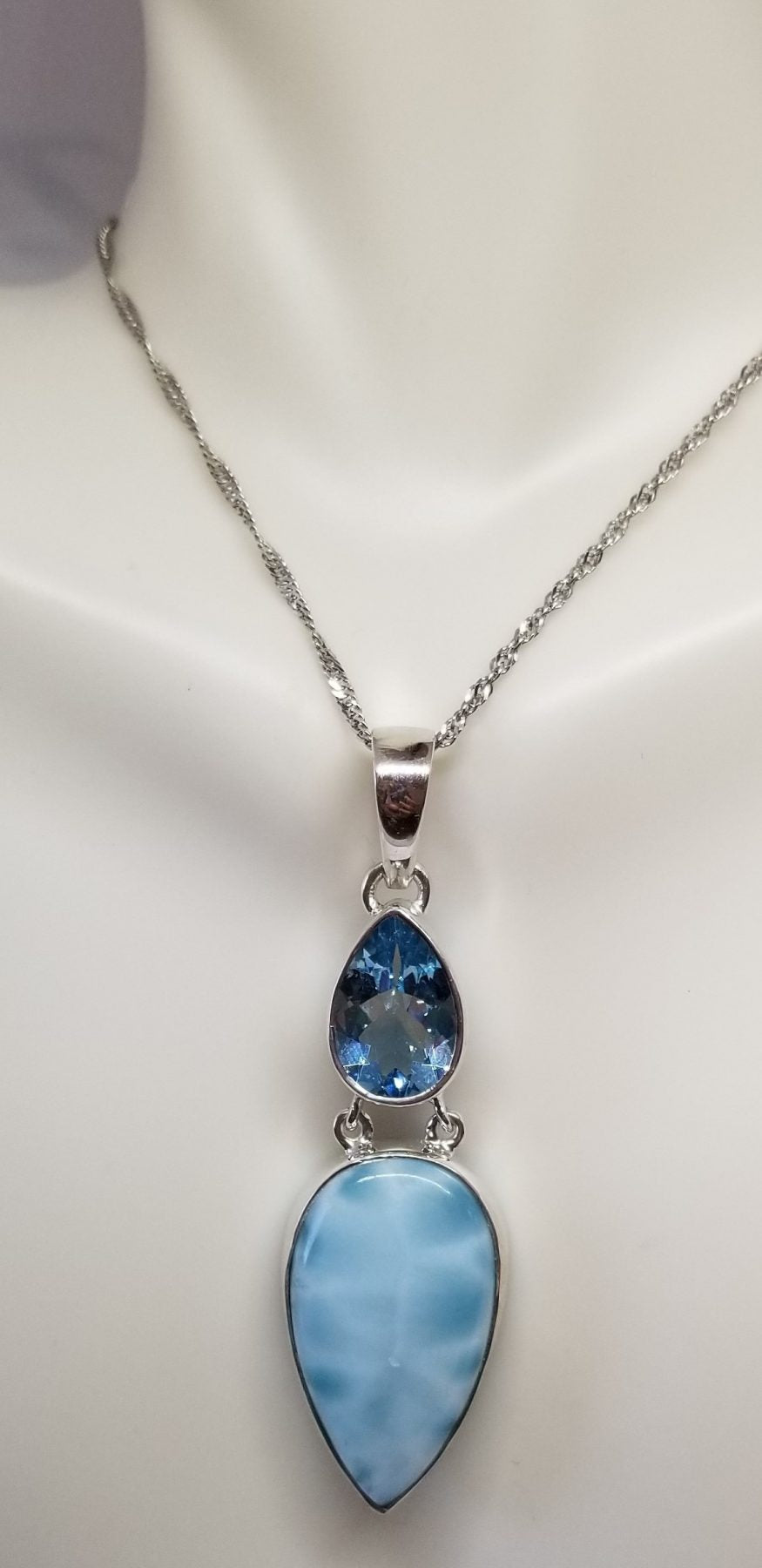 Larimar Pendant with light blue topaz accent gem