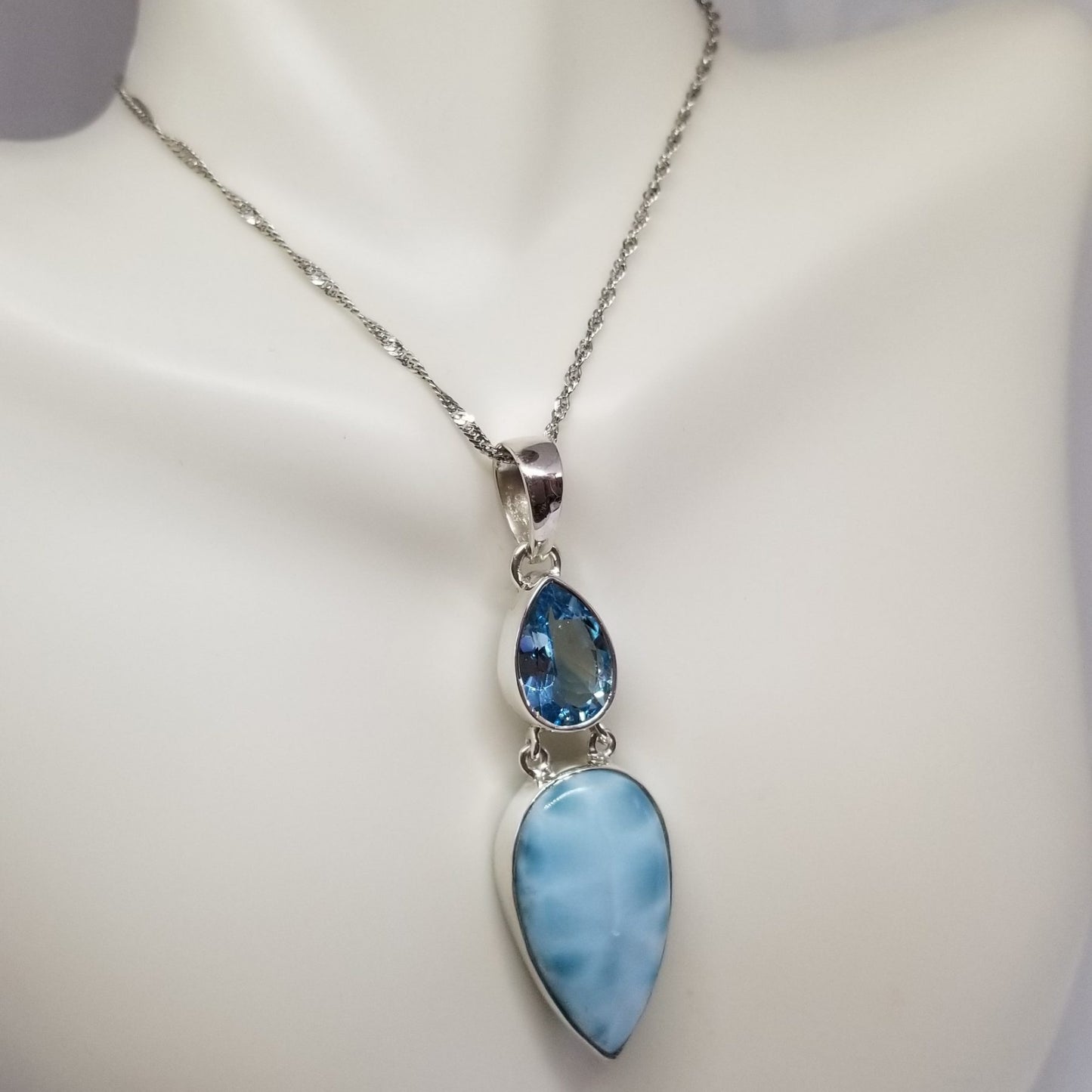 Larimar Pendant with light blue topaz accent gem