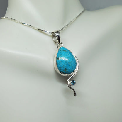 Turquoise Pendant accented by Blue Topaz